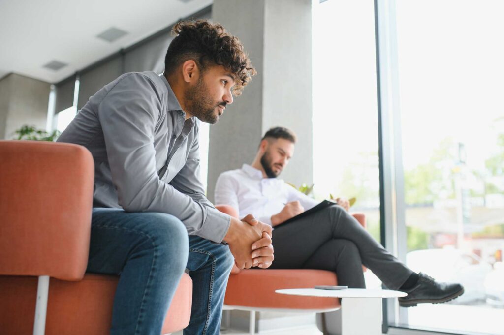 men waiting for results from cocaine detection tests.