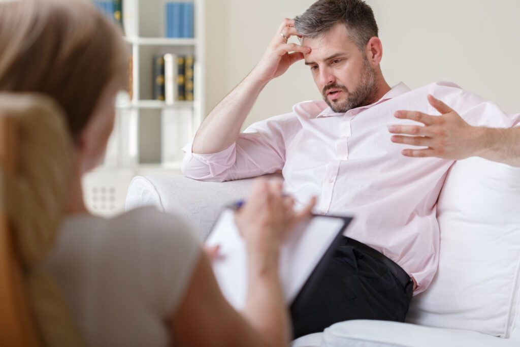 Man in recovery speaking about work-life balance.