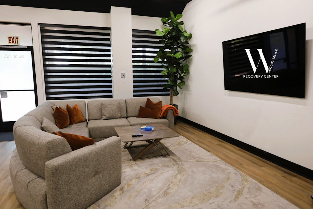 Comfortable lounge with a large sectional sofa for clients in dual diagnosis treatment Comfortable lounge with a large sectional sofa for clients in dual diagnosis treatment
